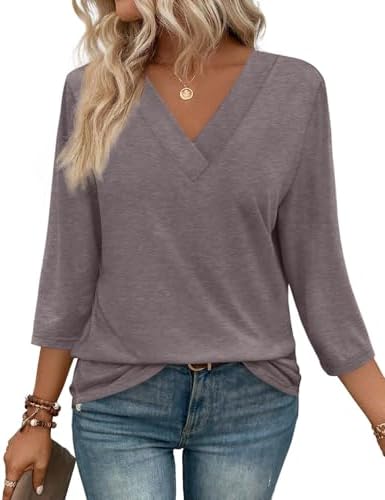 A relaxed v-neck tunic in neutral taupe, cut with three-quarter sleeves from a stretchy, wrinkle-resistant lightweight knit.