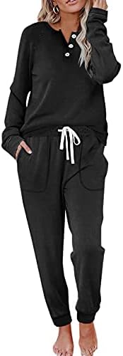 Cut in solid black thermal fleece, this two-piece set pairs a henley top with drawstring pants for cool weather.