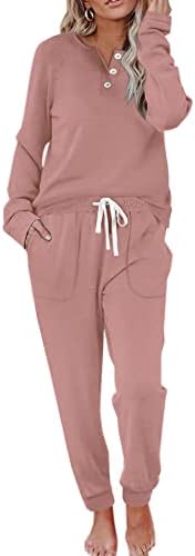 A soft thermal fleece two-piece set in dusty pink, pairing a buttoned henley long sleeve with drawstring sweatpants.