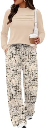 Warm beige tones ground the patterned wide-leg pants on this two-piece knit set, paired with a solid long-sleeve mock neck top.