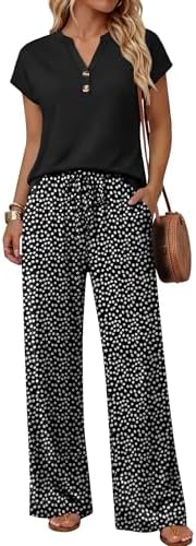 A soft black floral print pairs lightweight wide-leg pants with a relaxed V-neck tee for easy travel days and warm evenings.