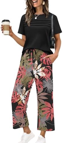 Tropical pink foliage against a deep black base defines this airy two-piece set, cut with wide-leg cropped pants and side slits.