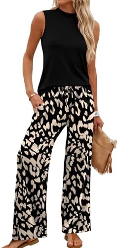 Graphic black print wide-leg pants pair with a solid mock neck sleeveless top in a lightweight stretch knit for travel days.