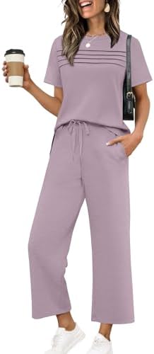 A rich purple spacer knit pairs a pleated short sleeve top with breezy wide leg crop pants for easy spring and summer packing.