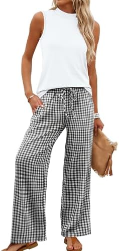 A crisp white and black plaid print covers these wide-leg lounge pants, paired with a solid cropped mock neck top.