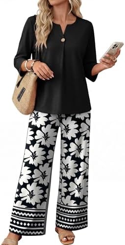 A dark botanical print pairs with breathable jersey in this two-piece set, cut with 3/4 sleeves and easy wide-leg pants.