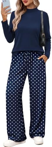 Crisp blue polka dots bring a classic graphic pattern to this lightweight mock-neck top and wide-leg pant pairing.