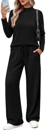 Jet black knit pairs a smooth mock neck top with breezy wide leg trousers for clean, unified travel dressing.