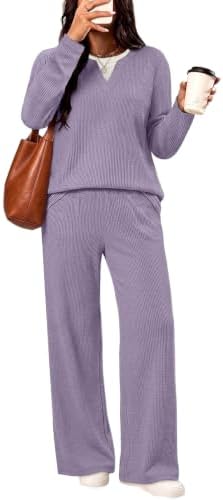 A rich purple hue brings depth to this textured two-piece set, cut with a relaxed v-neck top and easy wide-leg pants.
