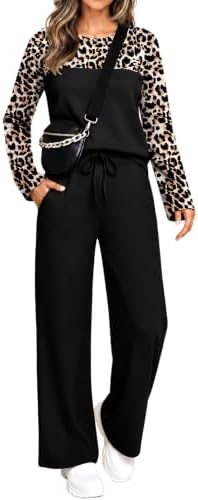 Muted black leopard spots pattern this smooth two-piece knit set, pairing a long-sleeve crewneck with relaxed wide-leg pants.