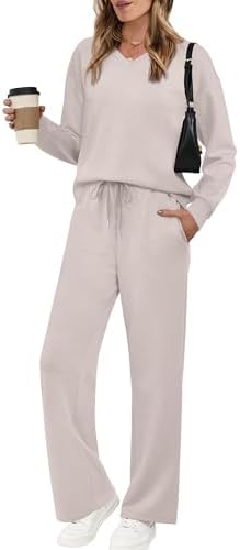 A soft light grey knit shapes this two-piece set, pairing a relaxed V-neck pullover with wide leg pants for easy layering.
