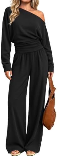 Cut in deep black knit, this two-piece set pairs an asymmetric off-shoulder top with relaxed wide leg trousers.