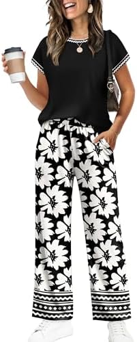 Crisp white contrast piping outlines this jet black two-piece set, pairing a cropped crew-neck tee with easy wide-leg pants.