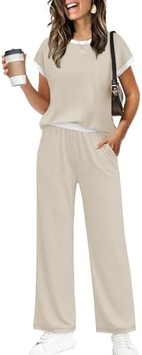 A soft beige two-piece set cut with a contrast trim crew neck tee and relaxed wide-leg trousers built for warm getaways.