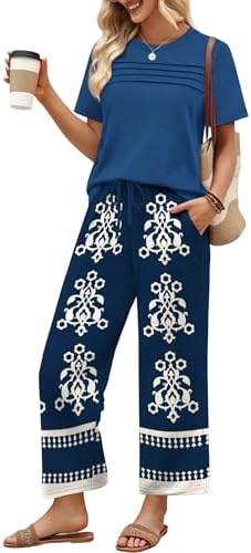 Short sleeves meet breezy cropped wide-leg pants in our Navy Boho set, combining a deep indigo ground with intricate print.
