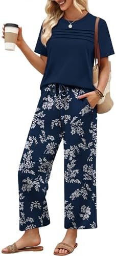 A crisp navy floral print enlivens this easy set with a pleated crewneck top and cropped wide-leg pants.