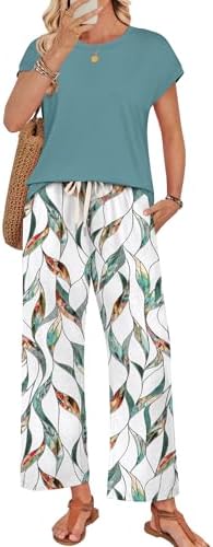 Crisp botanical vines trail across this soft two-piece lounge set, cut with cap sleeves and airy wide-leg pants.