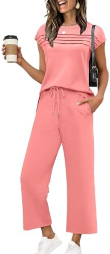 Dyed in a bright coral shade, this spacer-knit duo pairs a pleated cap-sleeve top with cropped wide-leg pants.