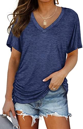 Side shirring gathers the hem of this dark blue dolman tee, giving an easy loose fit that pairs cleanly with white denim.