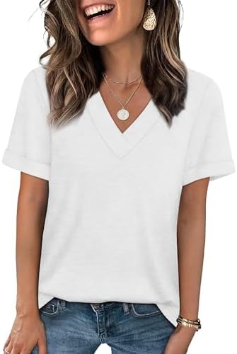 A soft knit summer tee cut with a neat V-neckline, rolled cuffs, and a loose drape through the body.