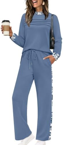 A crisp blue pattern covers this airy two-piece set, cut with a pleated long-sleeve top and breezy cropped wide-leg pants.