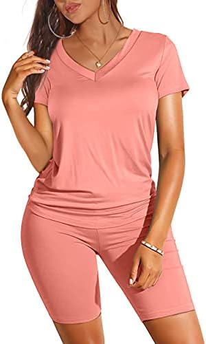 Bright coral pink adds warm summer energy to this relaxed V-neck tee and matching high-waist biker shorts set.