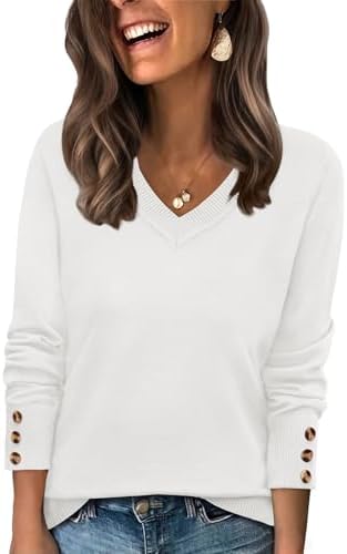 Crisp white knit makes this relaxed tunic sweater an easy match for dark denim or tailored trousers on cool days.