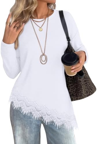 An airy crewneck top cut in crisp classic white with long sleeves and delicate lace along the curved hemline.