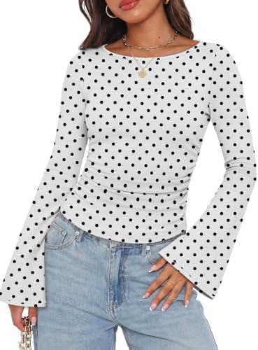 Crisp white polka dots bring playful contrast to this slim ribbed knit top cut with bell sleeves and gentle side ruching.