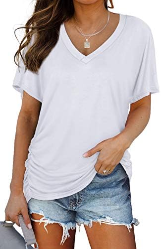 Crisp white jersey pairs with relaxed dolman sleeves and subtle side shirring for a clean, easy summer layer.