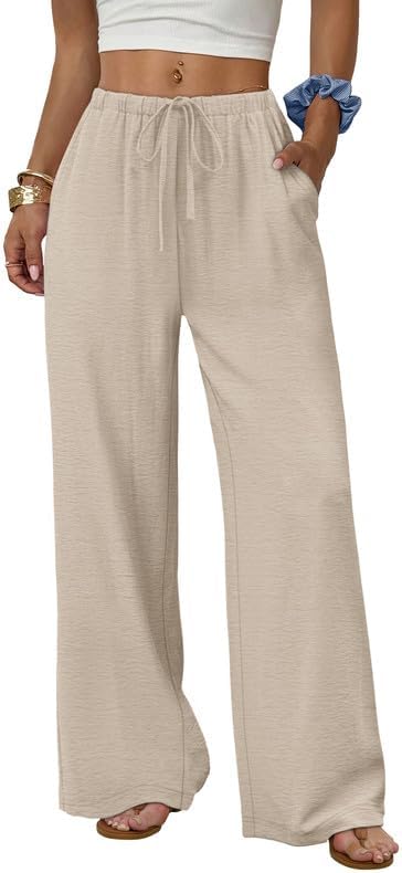 Light beige palazzo trousers cut wide through the leg with a drawstring waist and side pockets for hot summer days.