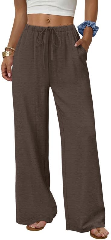An airy wide leg cut in warm brown polyester with a flexible drawstring waist and deep side pockets for summer days.