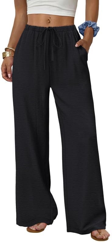Cut with a sweeping palazzo leg in breathable black knit, these mid rise trousers keep you cool on warm afternoons.