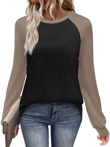 Deep coffee sleeves meet a solid black body in this soft raglan knit designed for cool mornings and easy layering.
