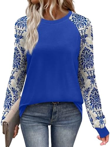 Contrasting blue boho print sleeves meet a solid body on this soft crewneck raglan tee cut for cooler evenings.