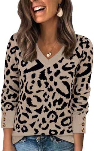 A relaxed leopard knit sweater finished with an open wide V-neck collar and trio button details along the cuffs.
