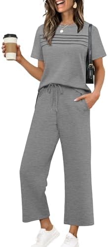 Heathered grey spacer knit pairs a pleated short sleeve top with cropped wide leg pants for warm mornings and cool airport gates.
